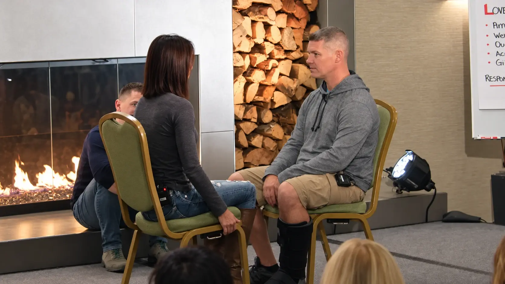 Partners facing one another during a fireside practice