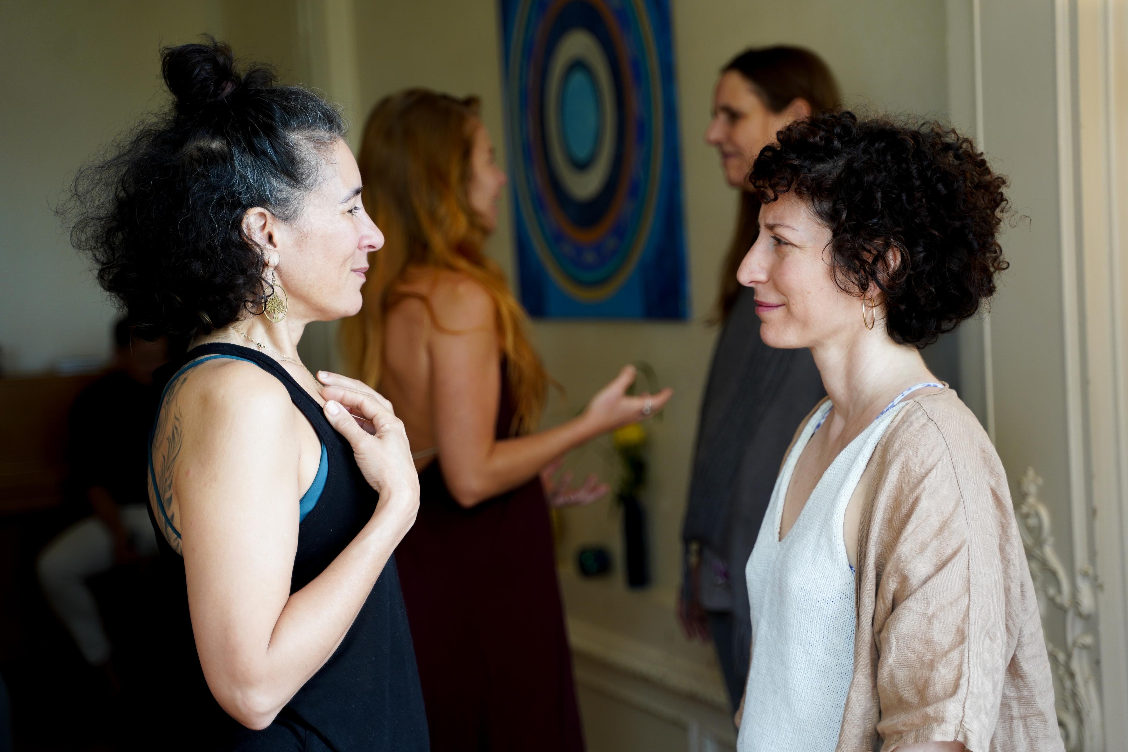 Two participants meeting each other with attentive eye contact at Love, Relationships and You