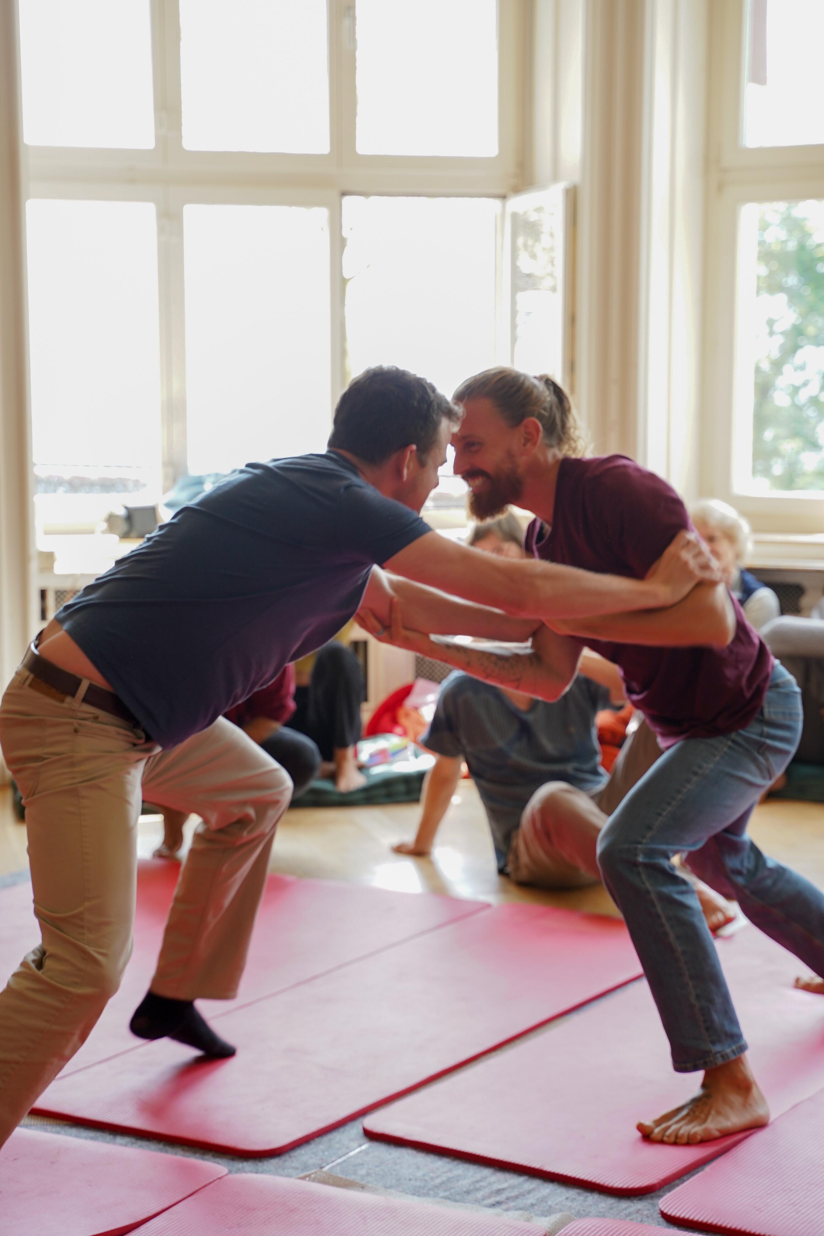 Two participants moving towards each other during a Love, Relationships and You practice
