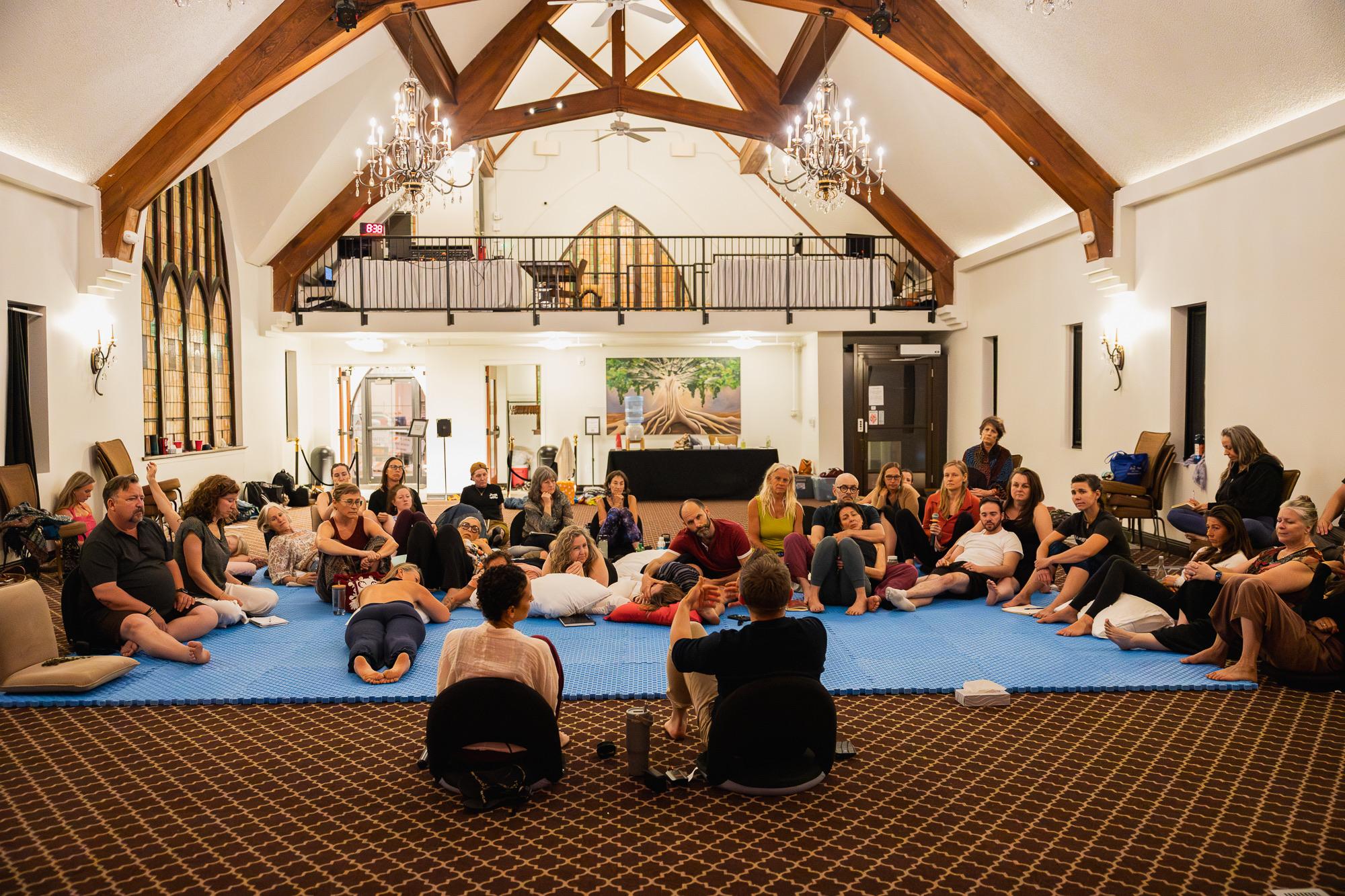 A full Heart iQ training room gathered in a circle