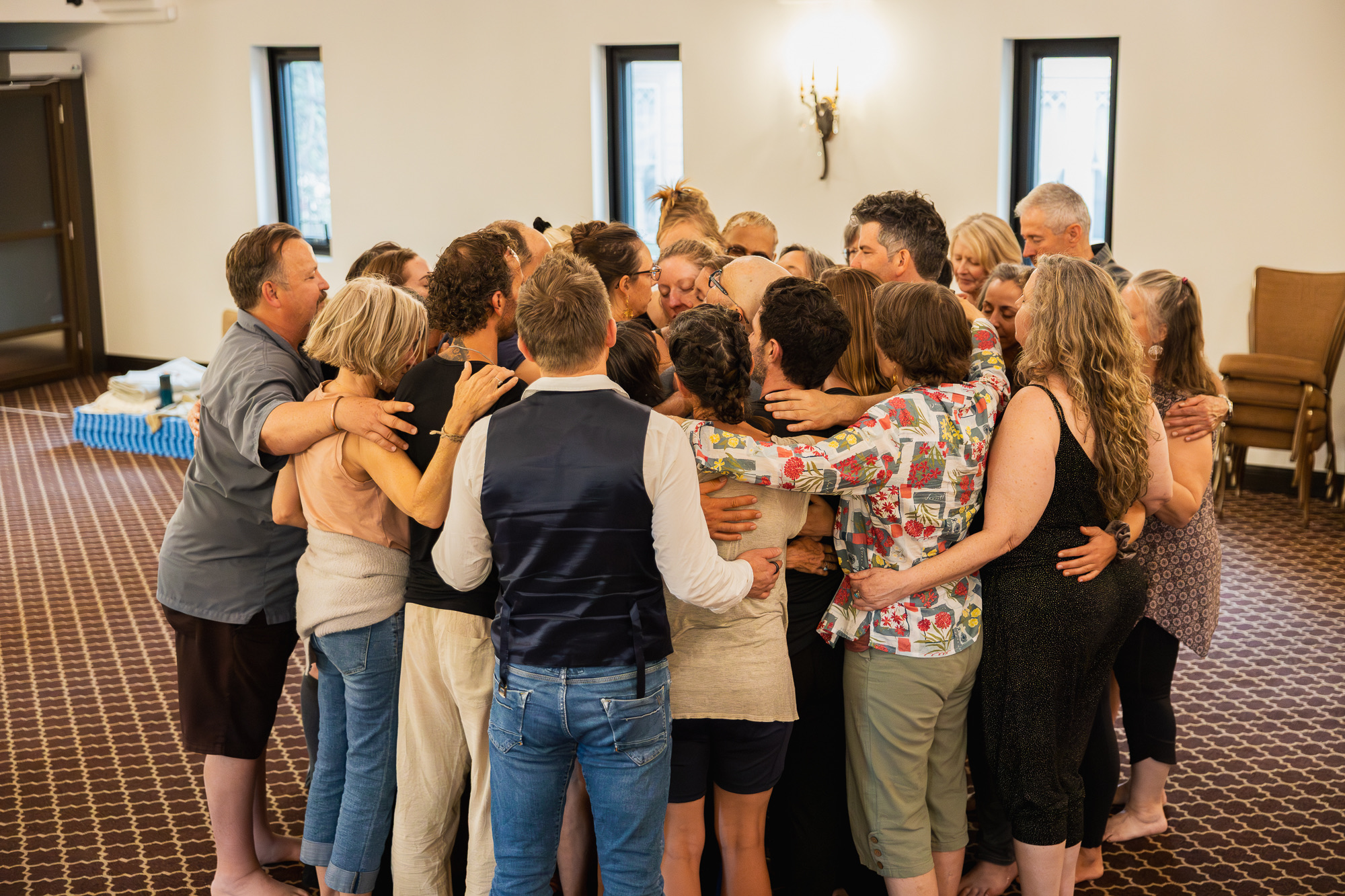 The group holding one of its own at a Heart iQ retreat